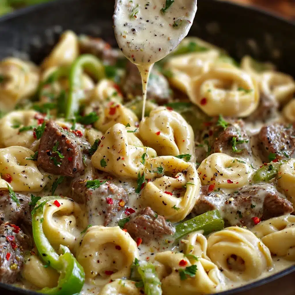 Easy Cheesesteak Tortellini in Rich Provolone Sauce Recipe - Recipe Image