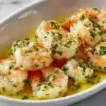 Transfer the pasta to a large baking dish, spreading it evenly Recipe