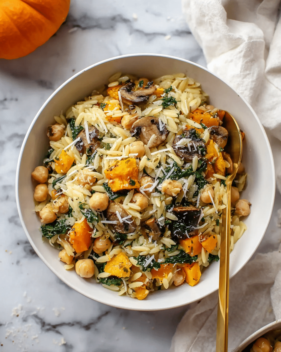 A white bowl filled with a mix of wild rice and chopped butternut squash pieces, topped with small white beans and herbs, creating a mix of light brown, orange, and green colors. A gold spoon is placed inside the bowl on the right side. The bowl sits on a white marbled surface next to a white cloth and a small orange pumpkin is partially visible in the top left corner. Photo taken with an iphone --ar 4:5 --v 7