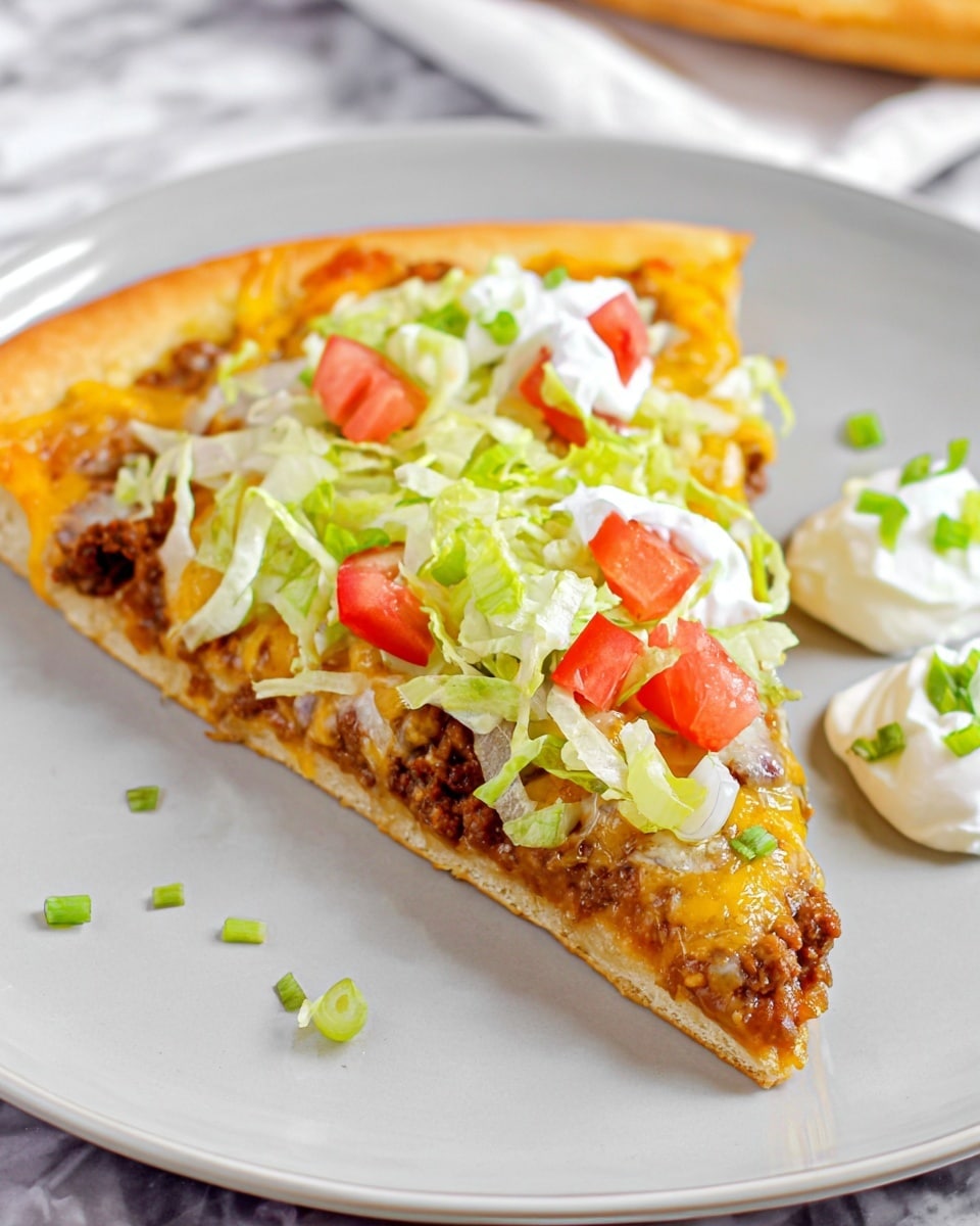 A single slice of taco pizza sits on a white plate, showing three main layers. The bottom layer is a golden-brown crust that looks soft but firm. Above the crust is a layer of melted cheese mixed with browned ground beef, giving a slightly oily and textured look. The top layer is fresh and colorful, made of shredded light green lettuce, diced red tomatoes, and small pieces of green onions scattered around. To the side of the slice on the plate are two dollops of sour cream, each topped with bits of green onion. The plate rests on a white marbled surface, adding a clean and bright background. Photo taken with an iphone --ar 4:5 --v 7